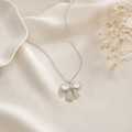 Pearl Bow Pendant Necklace | Silver CZ Ribbon Necklace for Women - Pettlez Jewellery