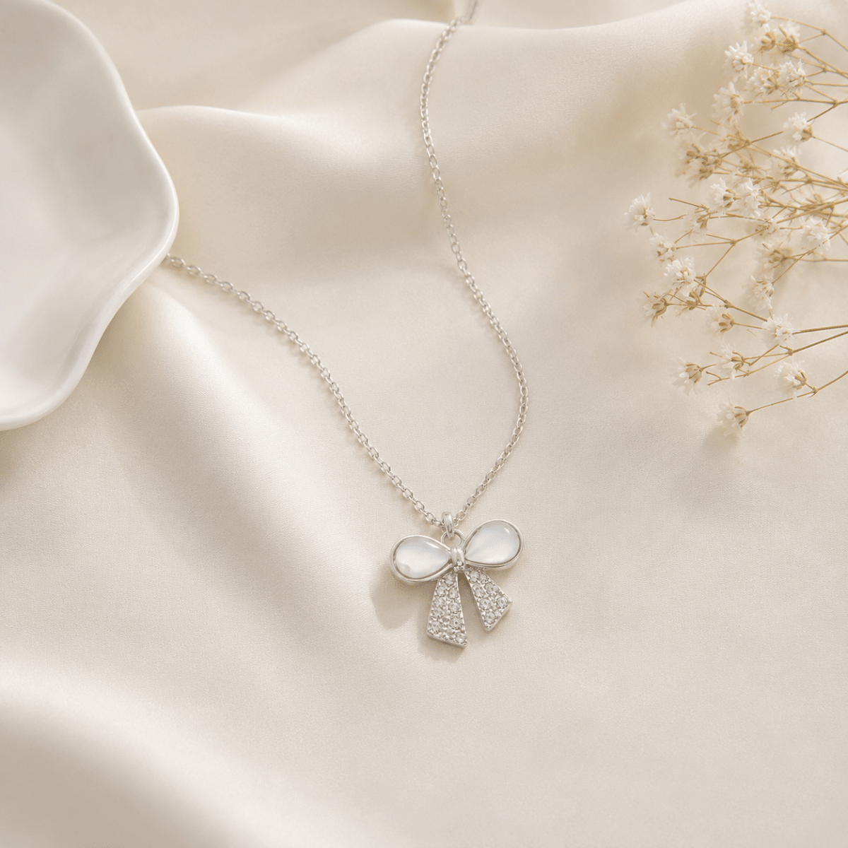 Pearl Bow Pendant Necklace | Silver CZ Ribbon Necklace for Women - Pettlez Jewellery